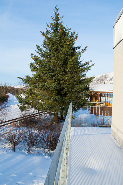 Thoristun villa, balcony - in winter with a view towards the mountains.